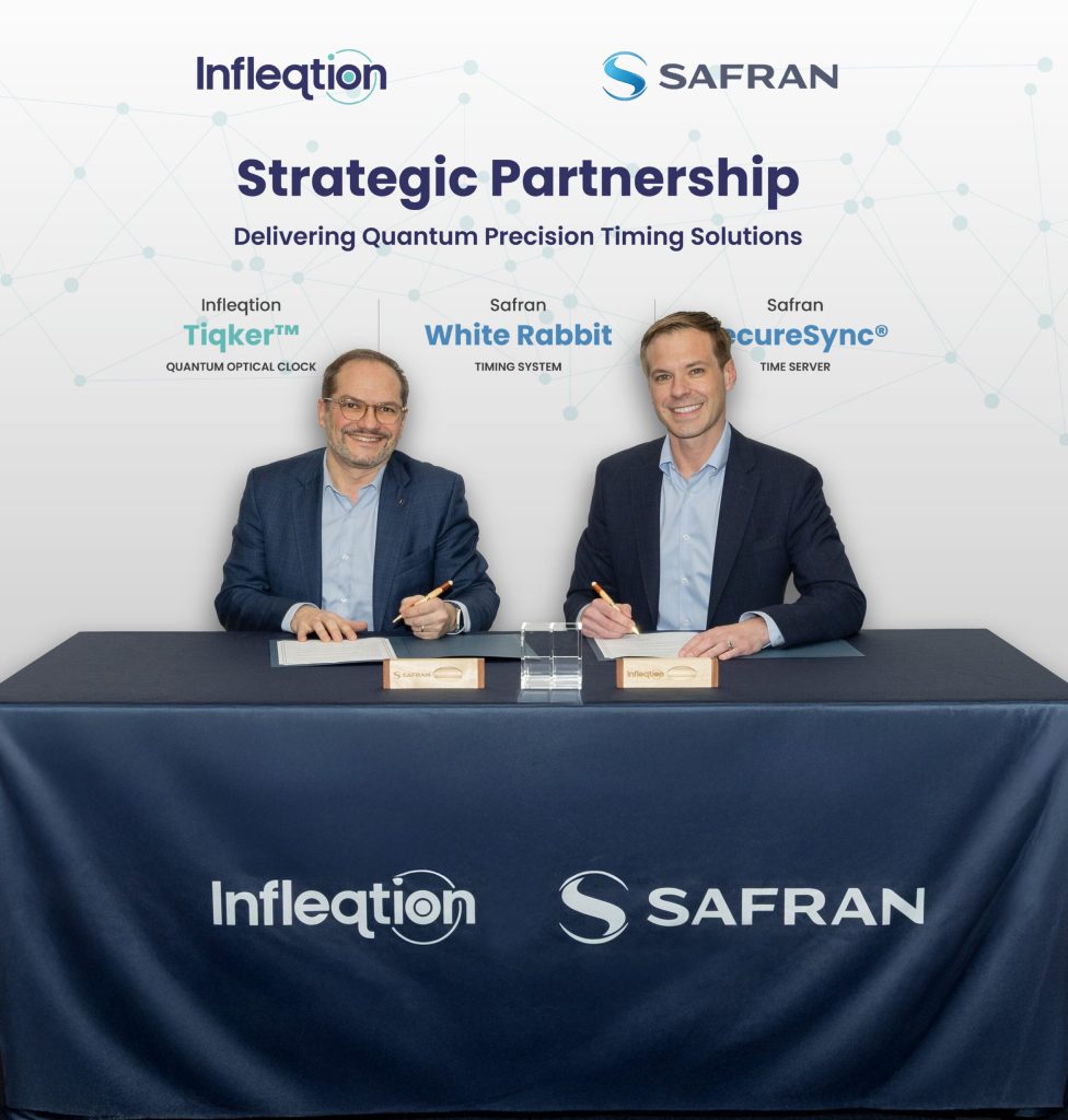 Maxime Gorlier, left, Director, One PNT Business Unit, Safran Electronics & Defense, and Matthew Kinsella, CEO of Infleqtion, sign a strategic partnership agreement.